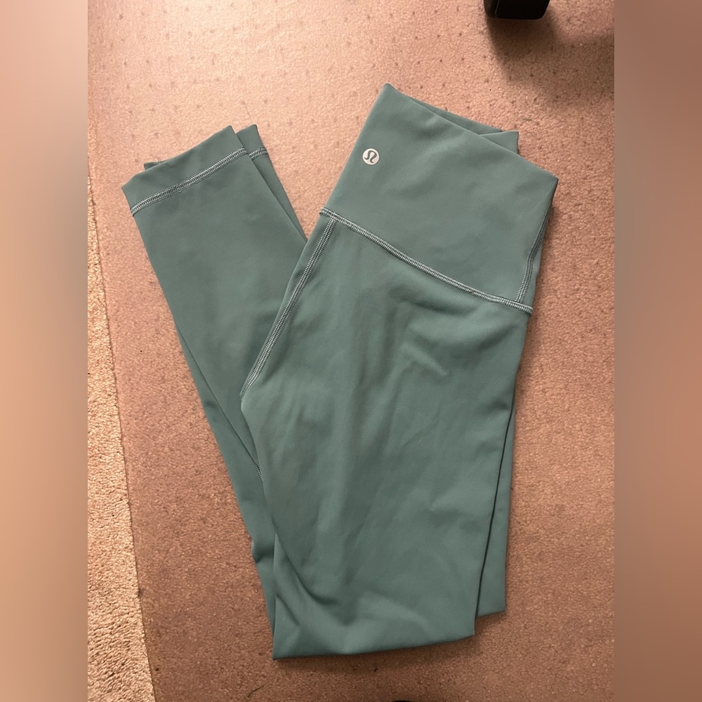 Lululemon leggings size 4 worn once- perfect condition